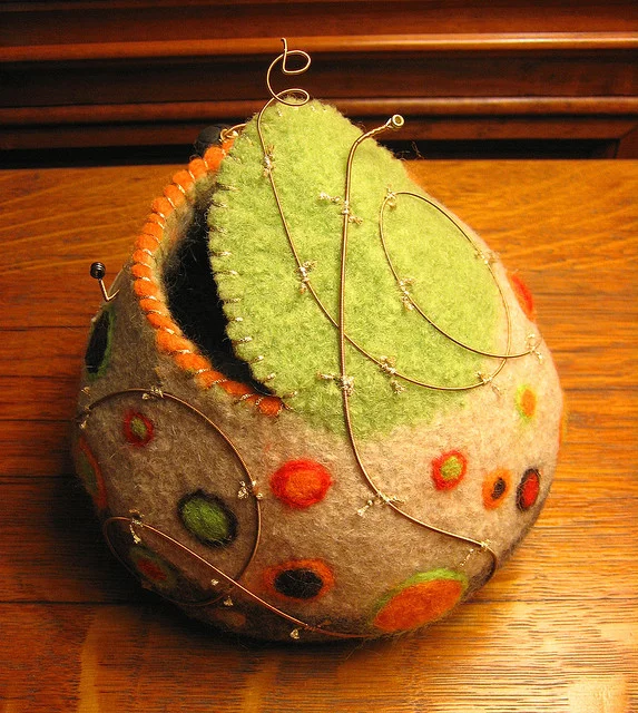 a tip jar :: hand-beaded wool felt sphere with guitar strings