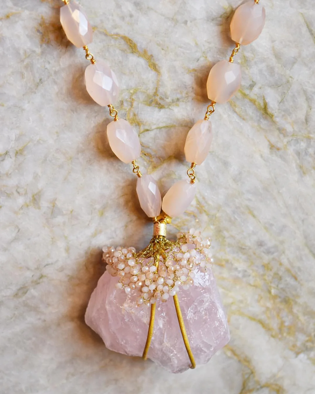 custom rose quartz necklace with crocheted gold threads and leather :: stone sizes and colors vary and subject to availability :: inquiries welcome