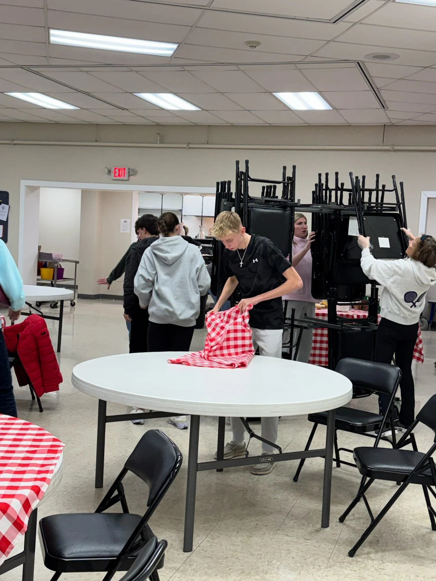 Volunteers setting up for a meal