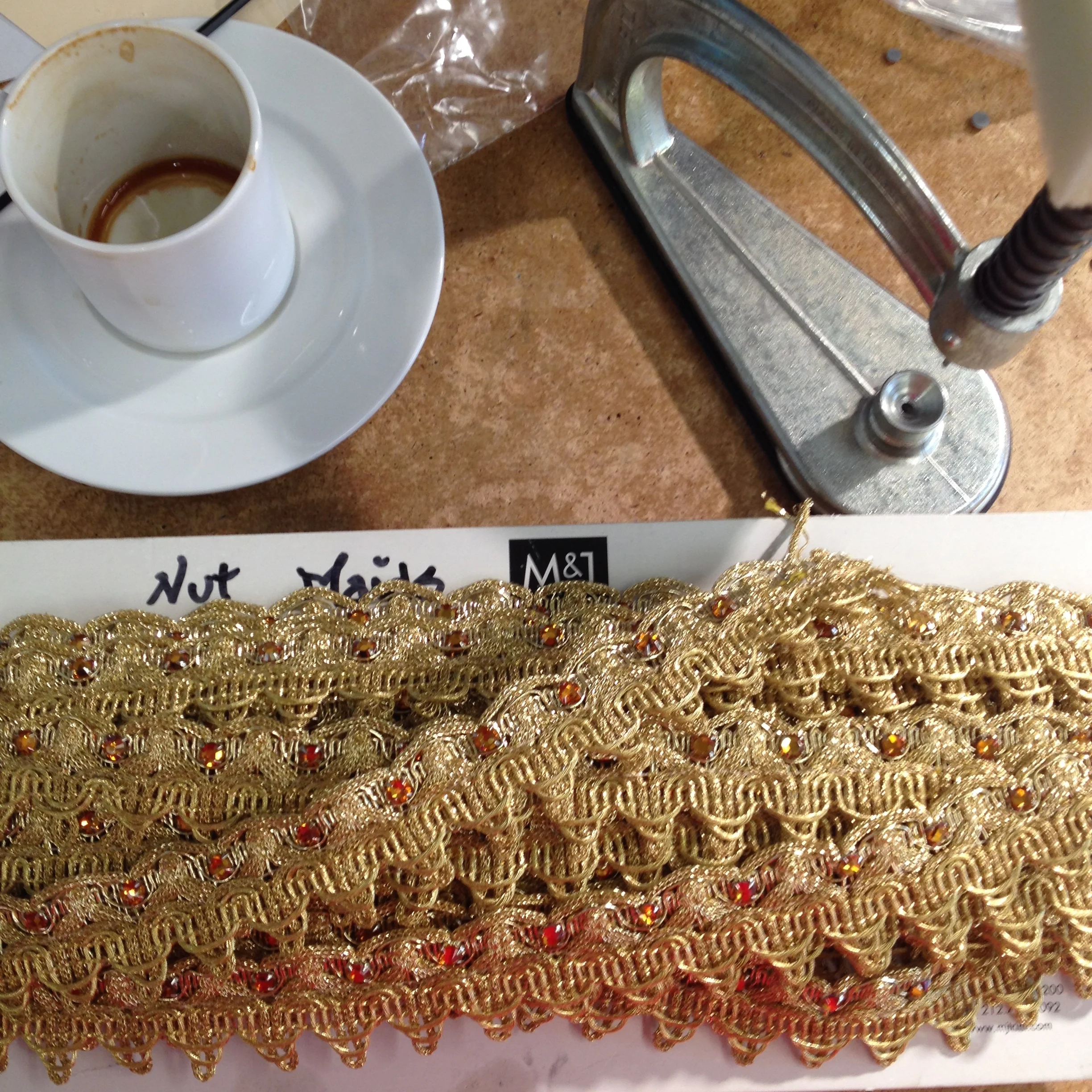 Certain trims were impossible to find replications of in store, so thousands of Swarovski crystals were studded by hand onto the trim.