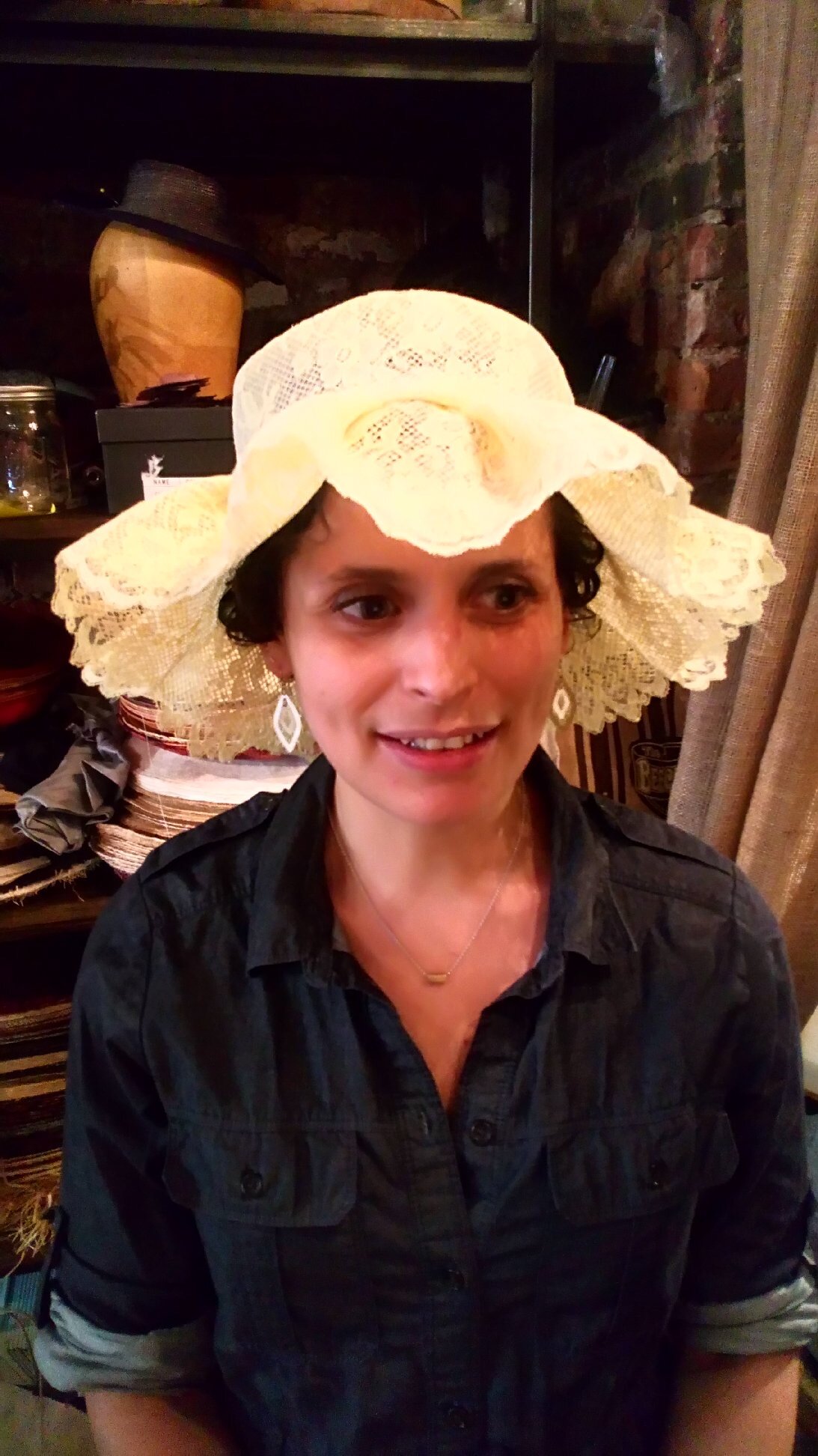 We custom built the bridesmaids' lace hats. This is the final hat.