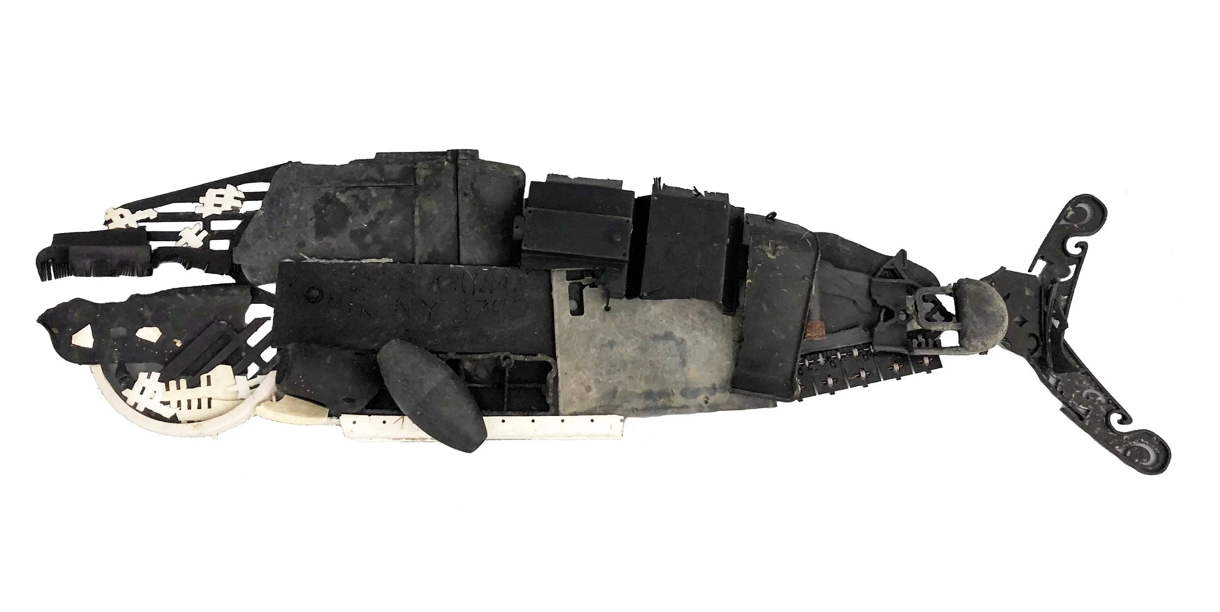 Right Whale I found plastic, rubber, asphalt 11” x 30” 2018 (available)