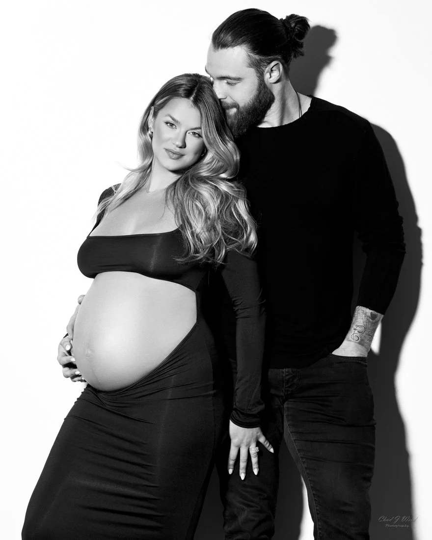 Embrace from side maternity couple photography pose