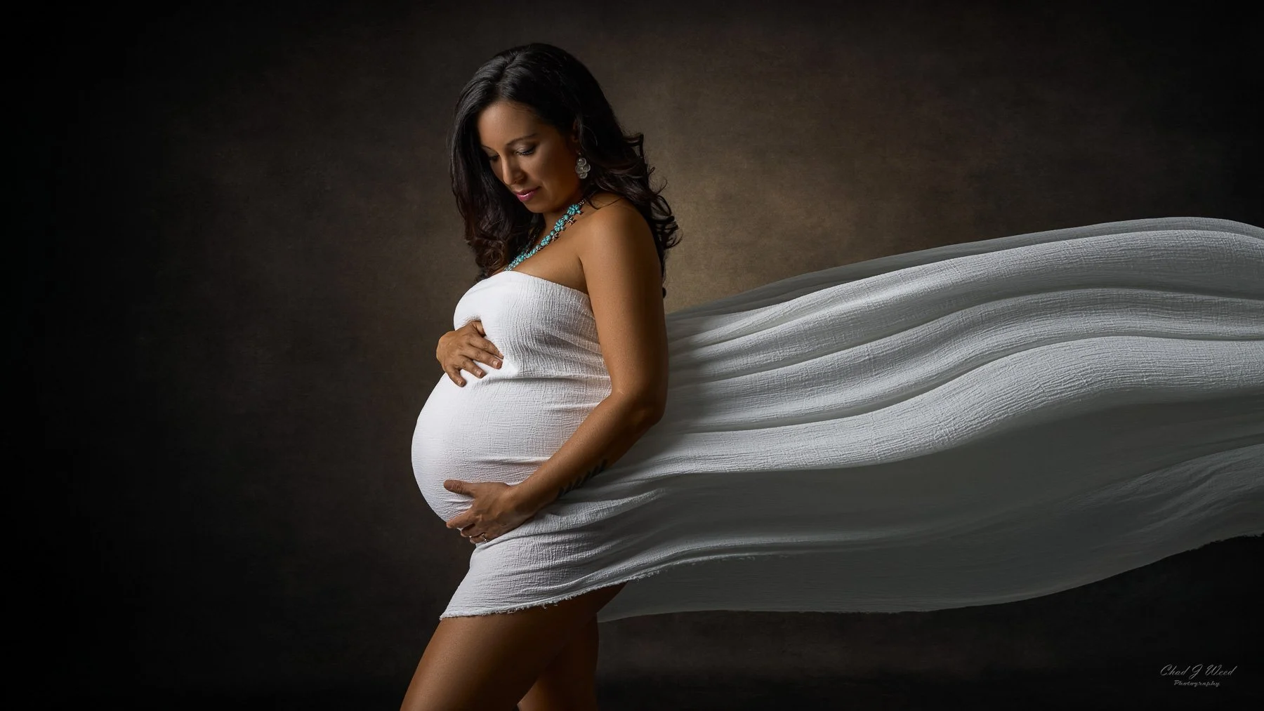 Mesa maternity photoshoot with soft flowing fabric styling