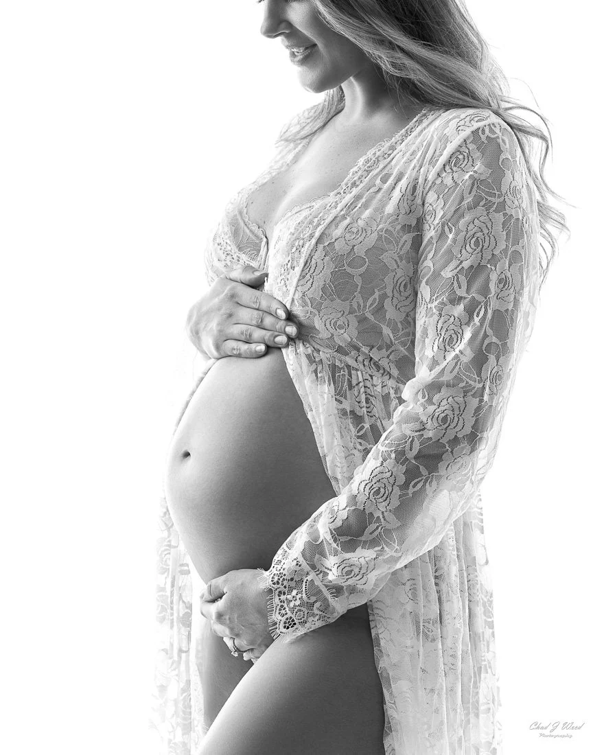 Maternity Photoshoot Ideas Phoenix: Close-up of hand on pregnant belly