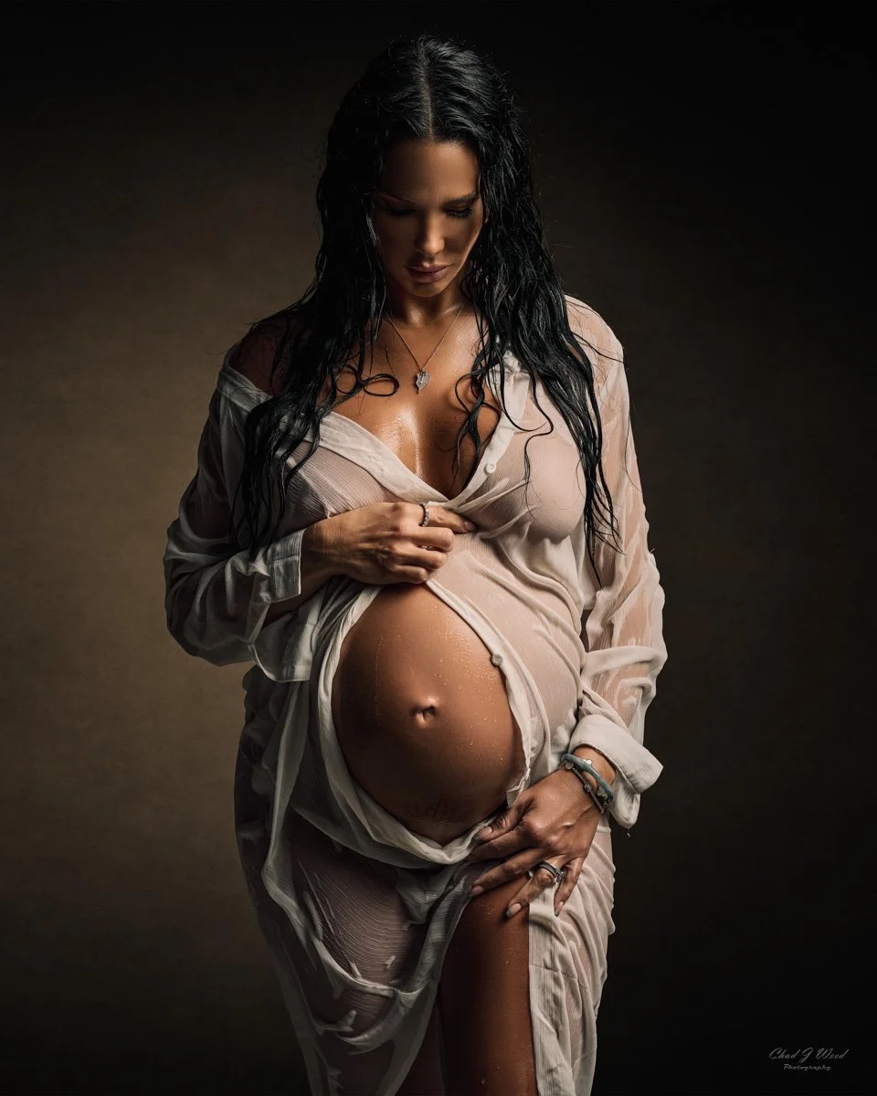 Phoenix maternity photography of pregnant woman in emotional wet look moment