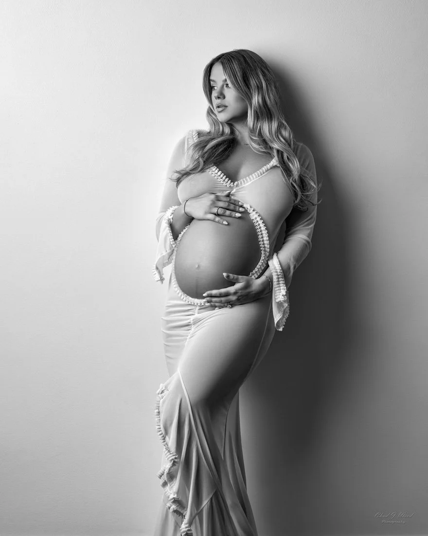 Phoenix Maternity Photography: Pregnant mother in a glamorous outfit during a personalized session