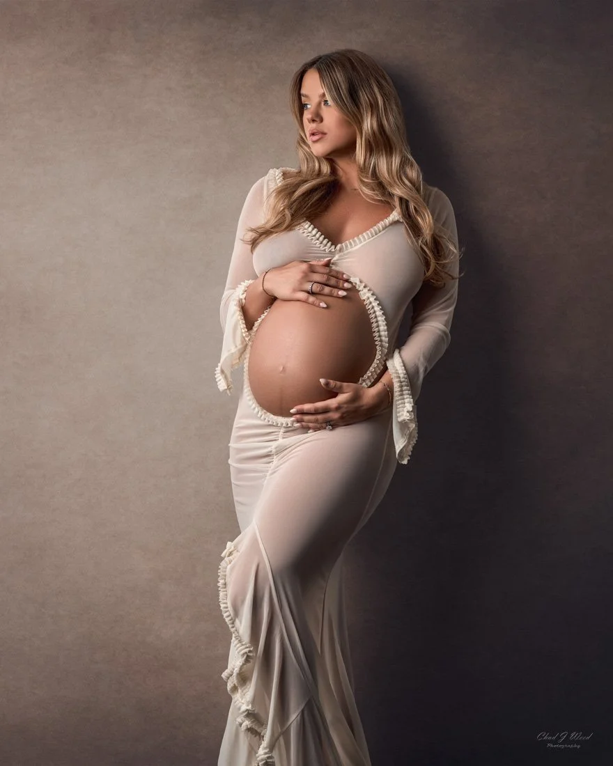 Studio maternity session with soft natural light