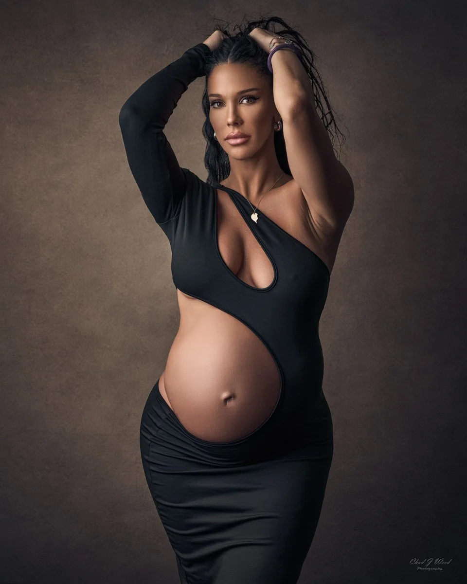 Fashion inspired maternity portrait with timeless backdrop