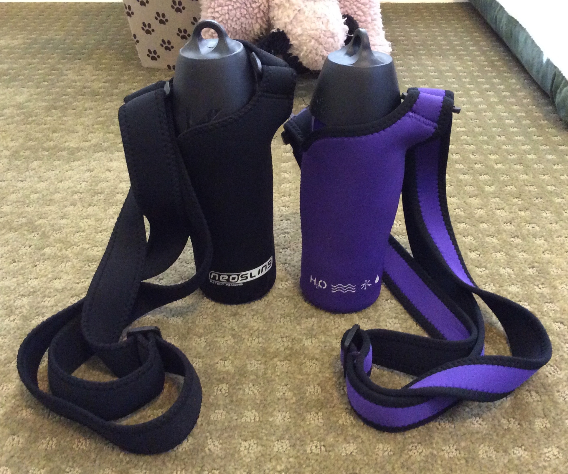 H20K9 Dog Water Bottles in their NEOSLING holders
