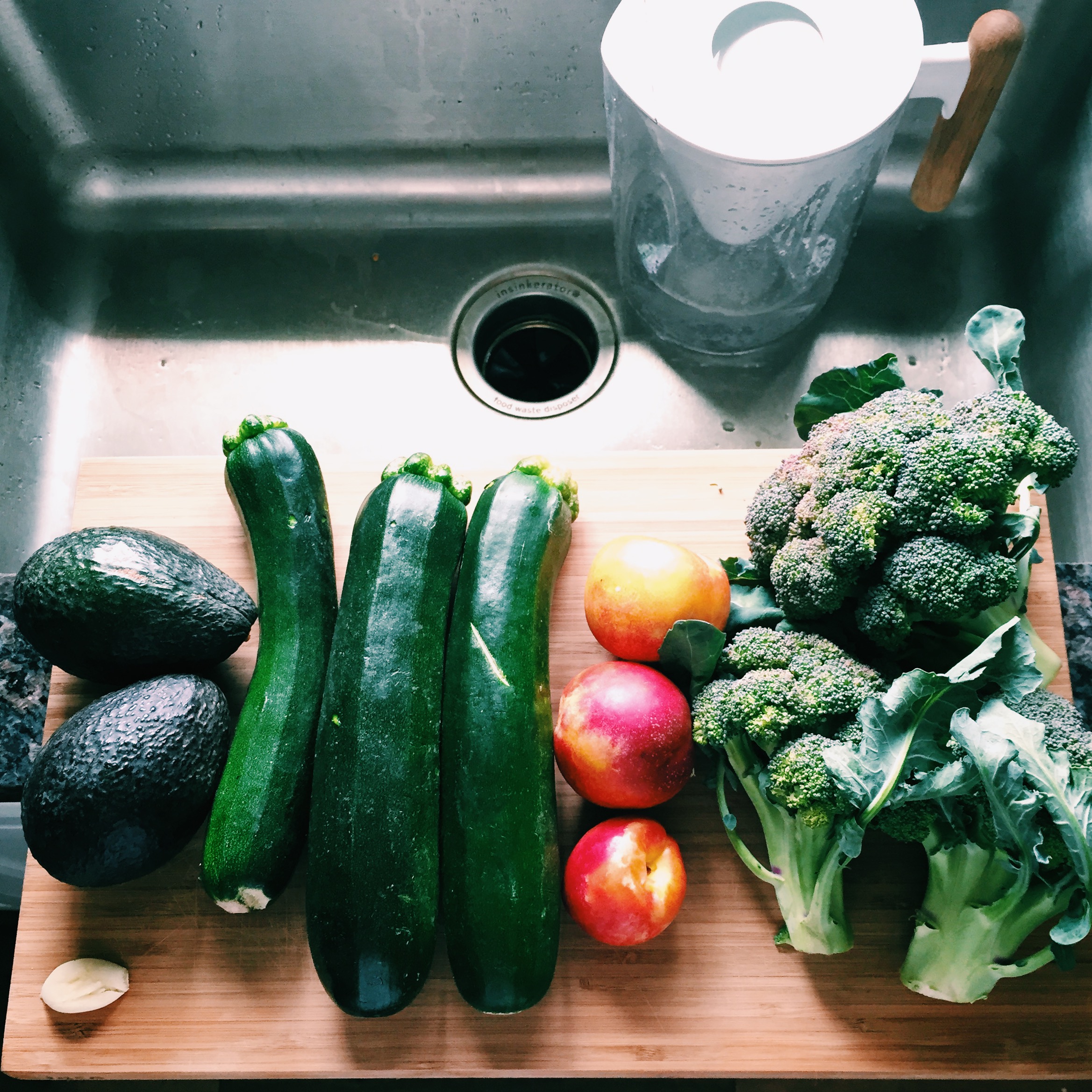Garlic, Avocado, Zucchini, Yellow Nectarines, Broccoli, all 100% Organic (not pictured: eggs!)