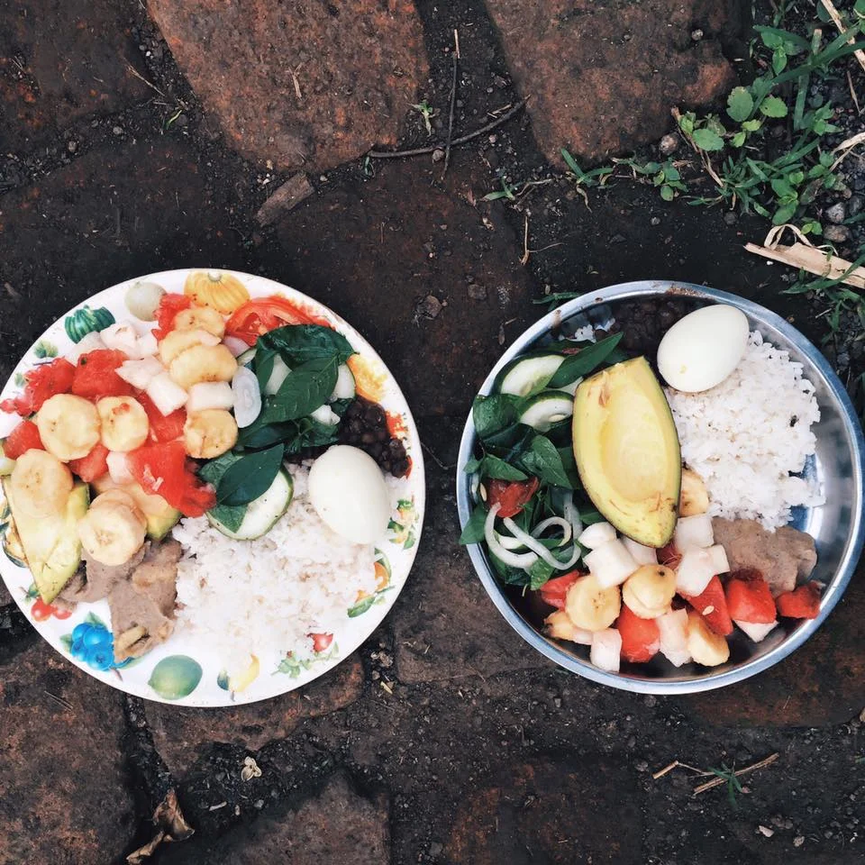 Our beautiful breakfast including: rice, beans, hard boiled eggs, avocado, fruit salad, sorghum puree, and cucumber salad. So fresh and so tasty. A meal to be remembered for sure!