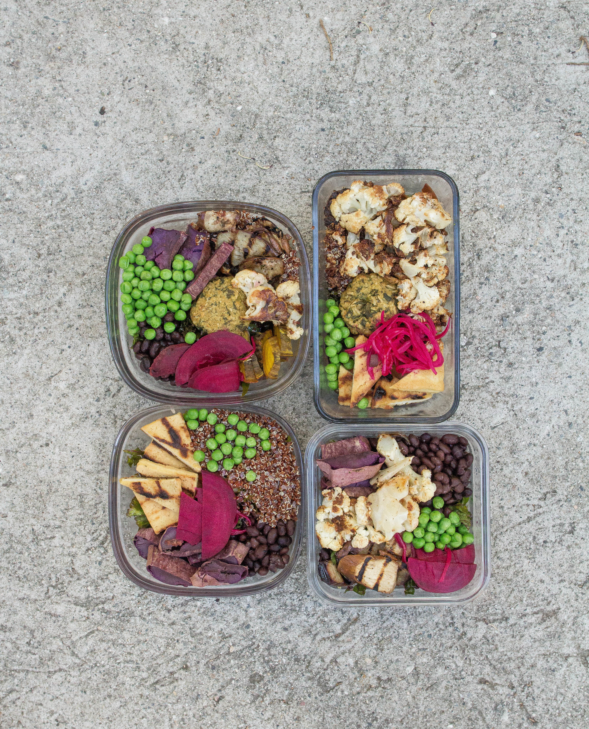 Assorted Salads for the week: roasted purple sweet potato, roasted cauliflower, falafel, black beans, quinoa, peas, grilled eggplant, roasted beets, tofu, massaged kale underneath (kale is a great meal prep trick- it's super hearty and actually tastes better the longer you let it soak. 