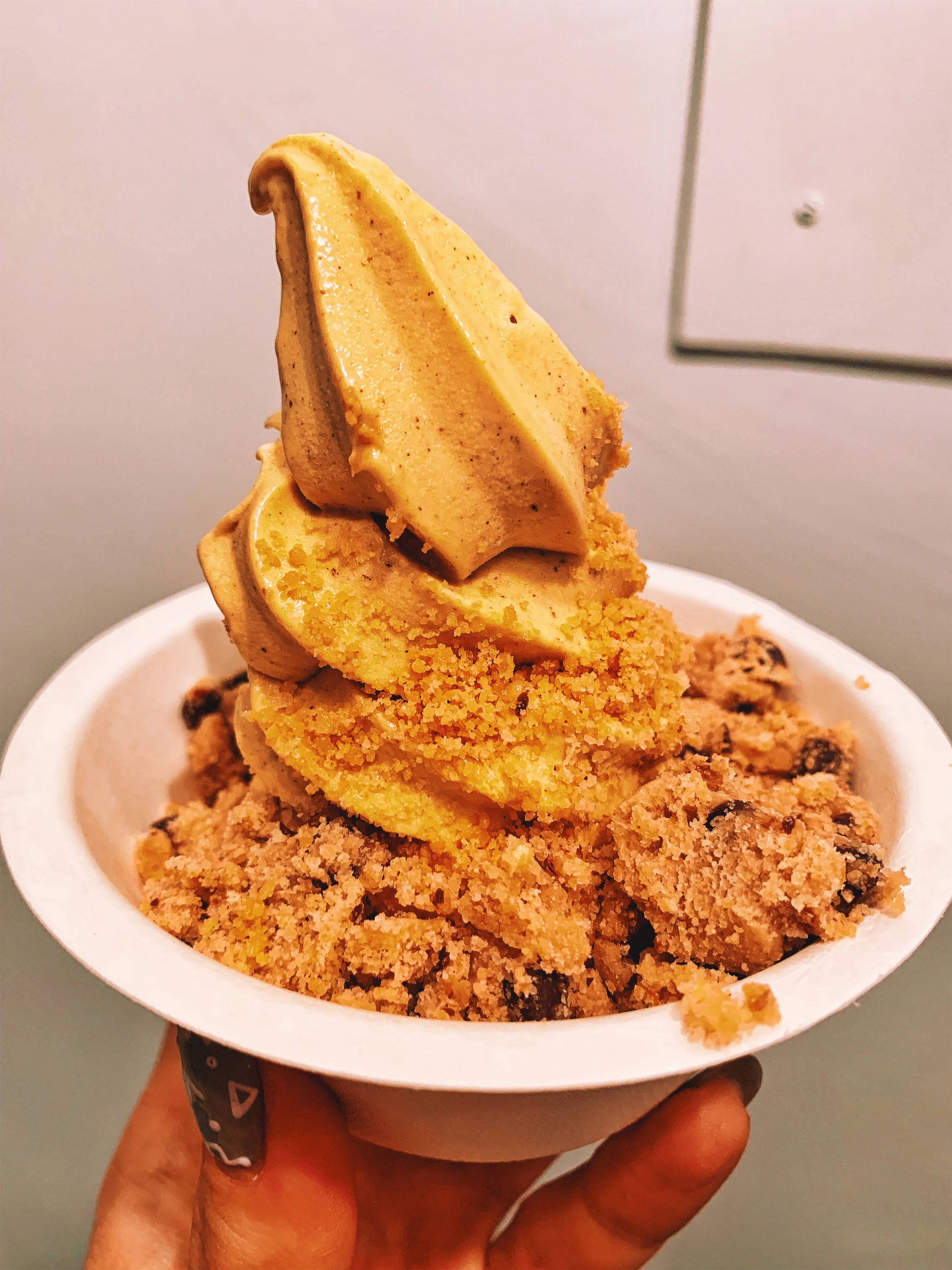 Pumpkin pecan pie organic non-dairy soft serve with cookie dough crumbles and peanut brittle at Eb & Bean