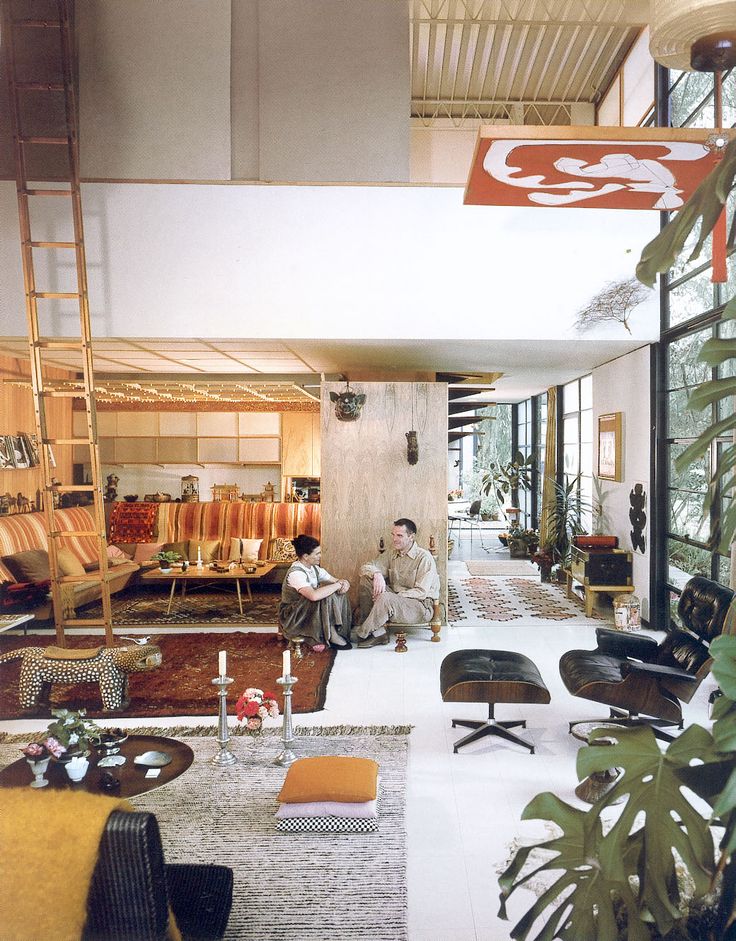 Charles and ray eames pictured in thier home. photo by julius schulman