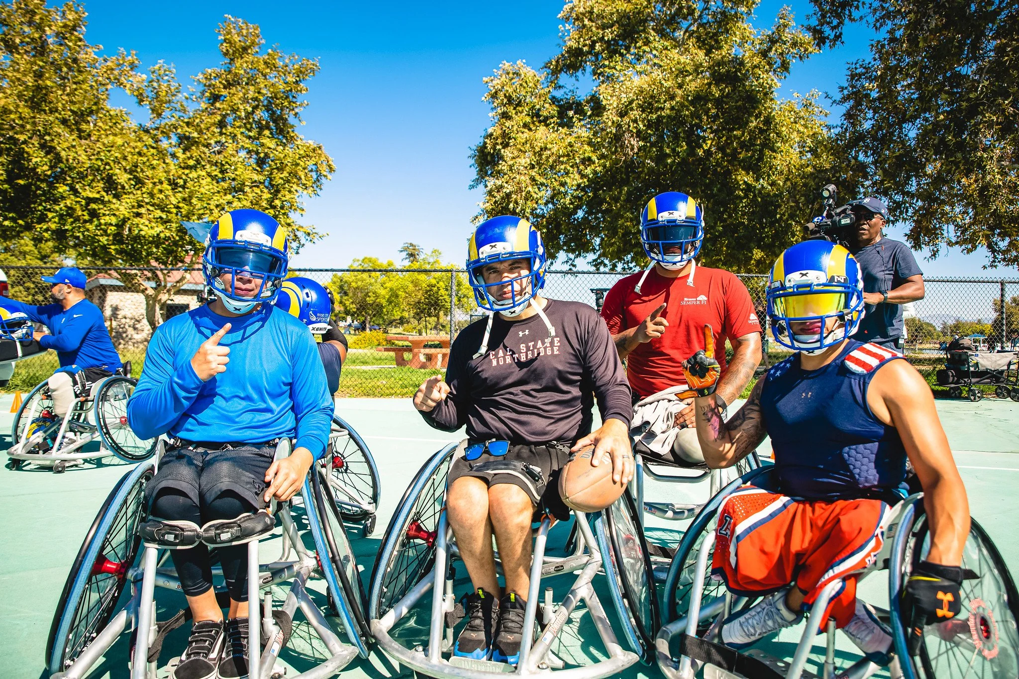 E_210829_Rams Wheelchair Football Team Helmet Delivery_5801-X4.jpeg