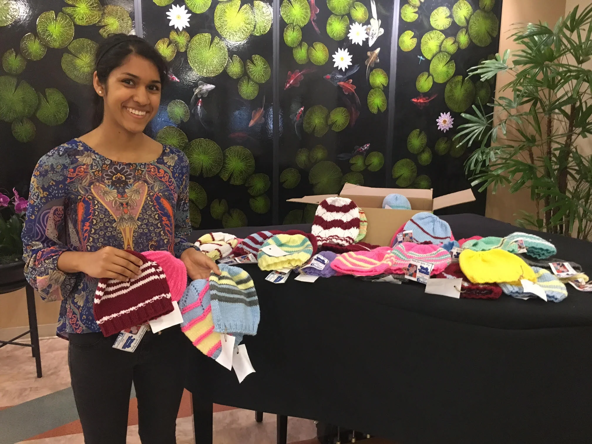 Nikita Salunke making a donation at Good Samaritan Hospital