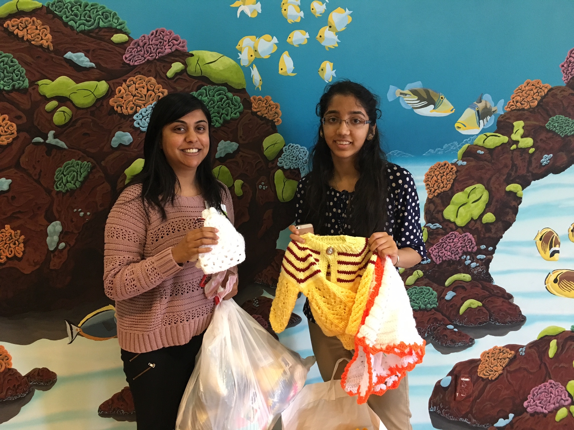 Mythri making a donation to Ms. Radha Dalal of Kaiser Permanente, Santa Clara