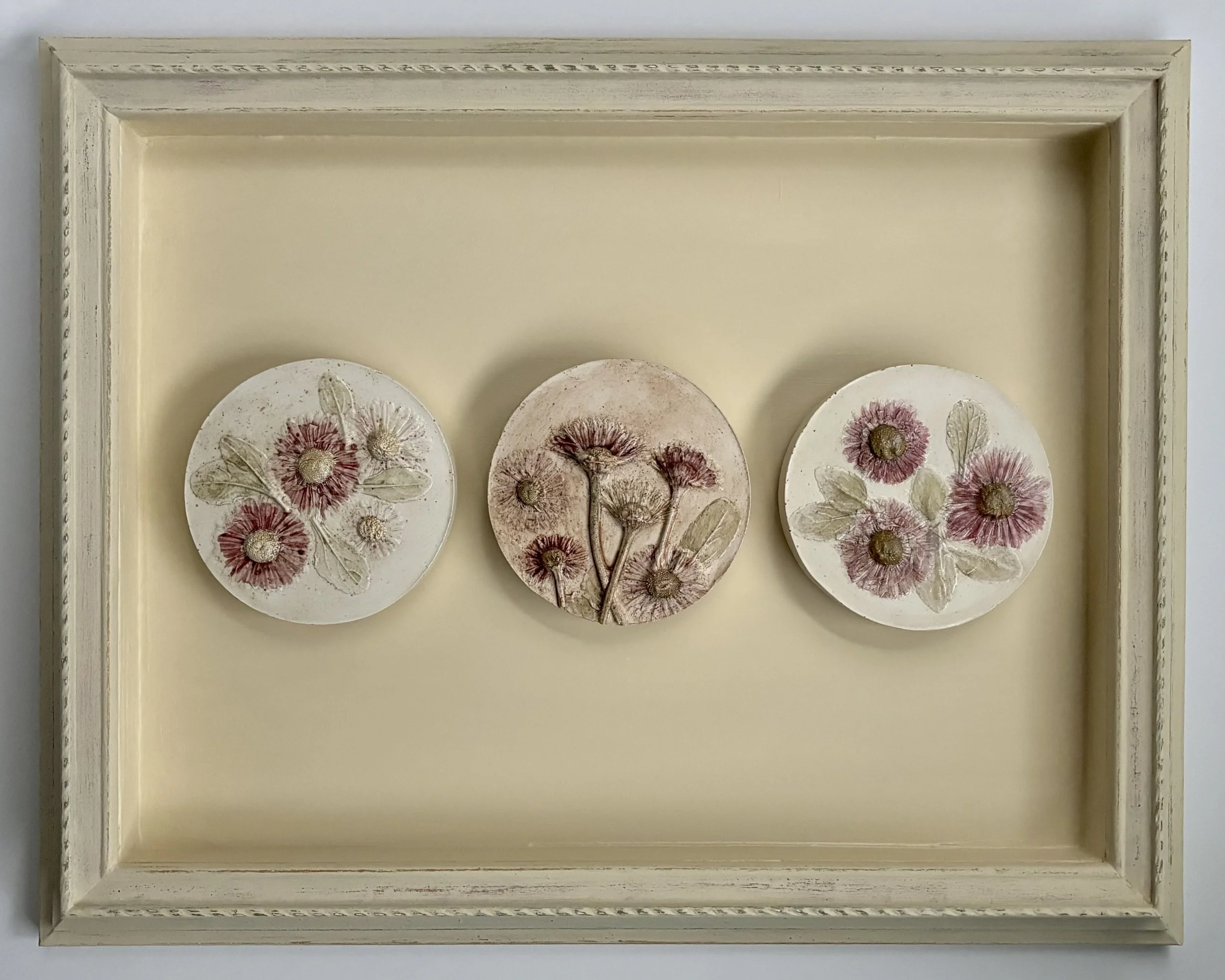  Natural Dreams, plaster, milk-paint, natural plant pigment (elderberry, rowan berry, red raspberry), milk-paint and mineral-paint on wood frame, 14.5in x 18.5in x 1.7in (ready to hang with picture-wire on back)    A triptych of botanical casts captu