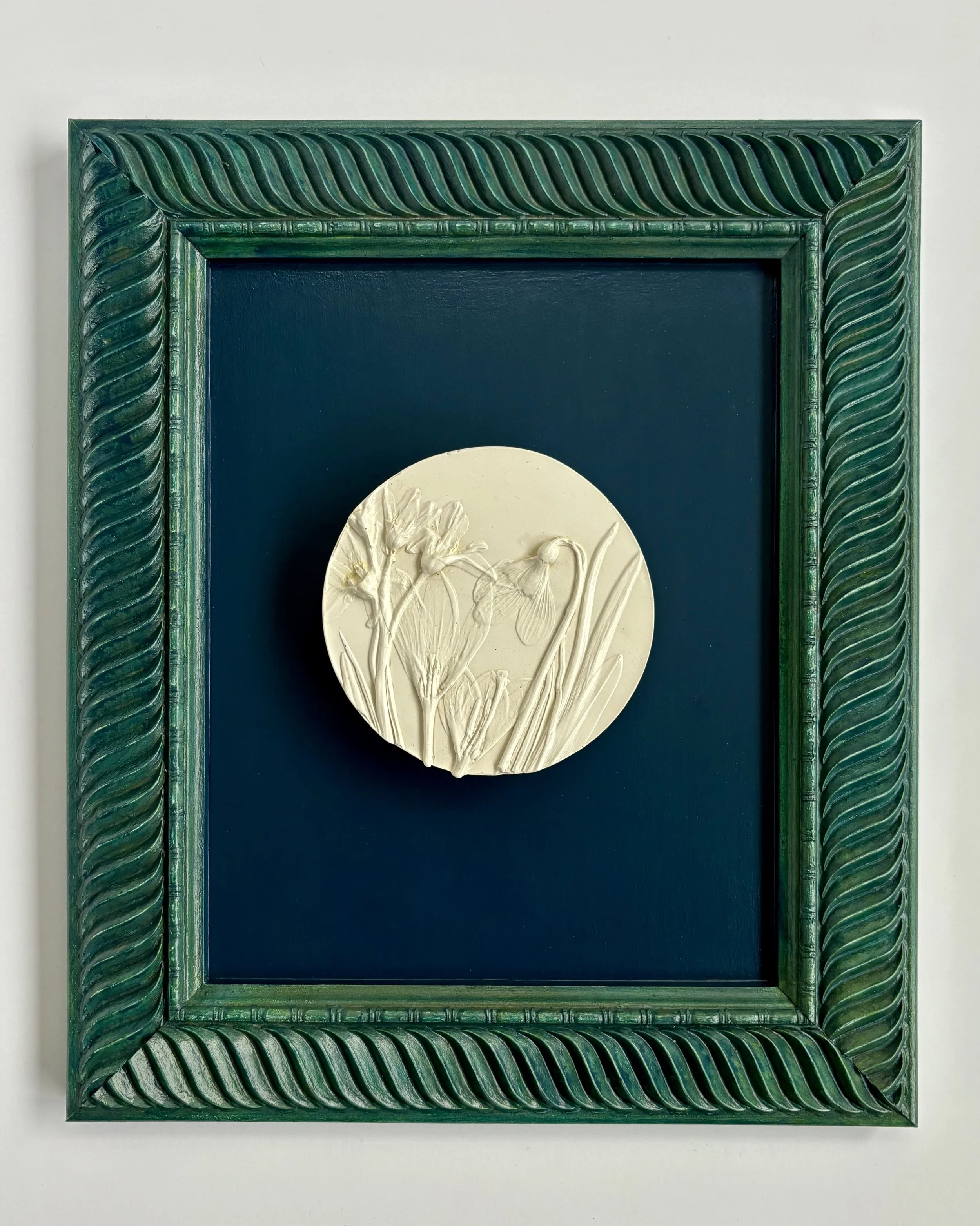  Renascent, milk-paint topcoat on plaster, milk paint and mineral paint on wood frame, 13in x 11in x 0.75in (ready to hang with picture-wire on back)    A tranquil scene of spring botanicals capturing the gentleness of the rising warmth following win