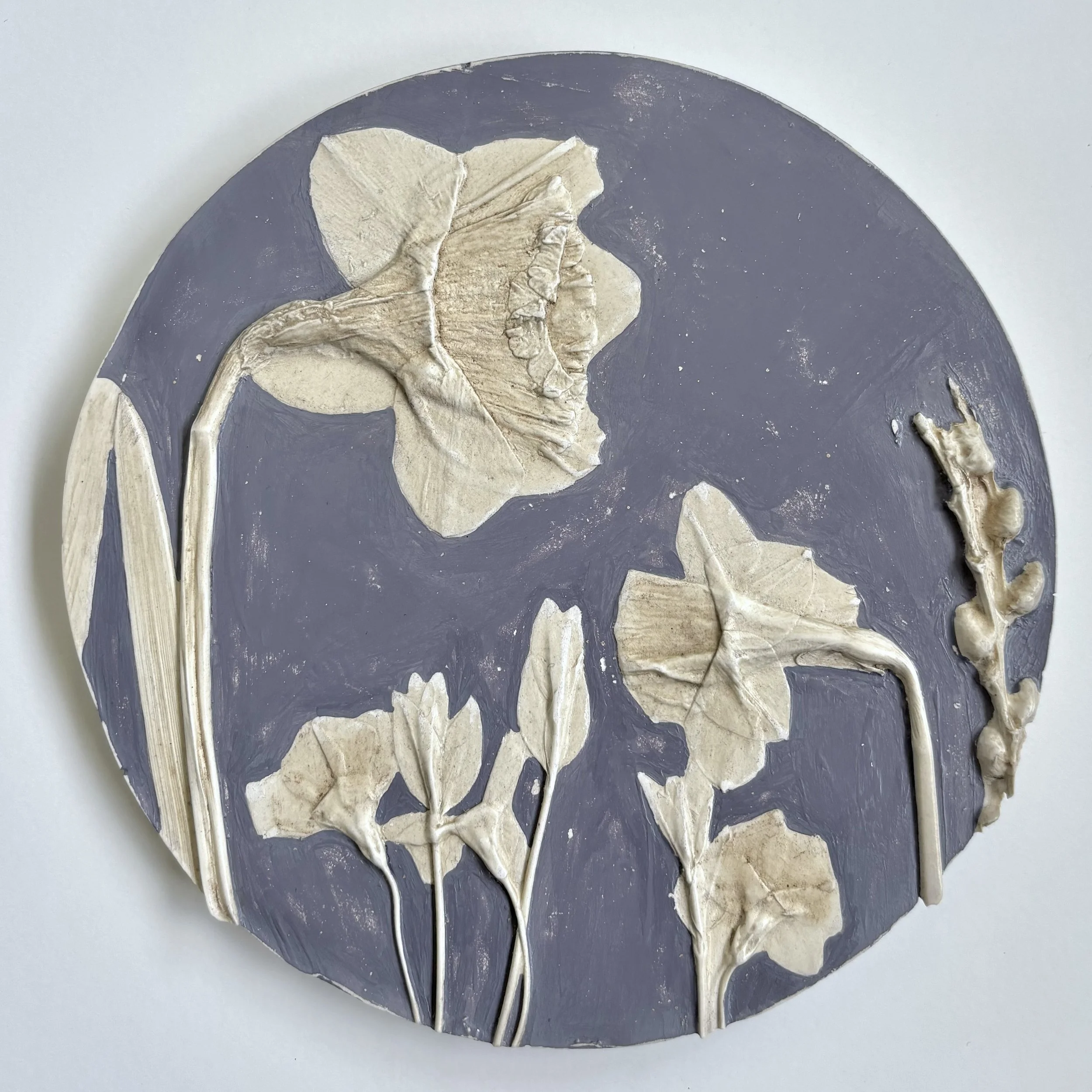  Purple Rain No. 2, mineral paint, natural pigment (elderberry, walnut leaf) on hydrostone, 6.7in round x 0.5in deep (ready to hang with picture-wire hook on back)   This piece embodies spring's essence, infusing vibrant colours and delicate textures