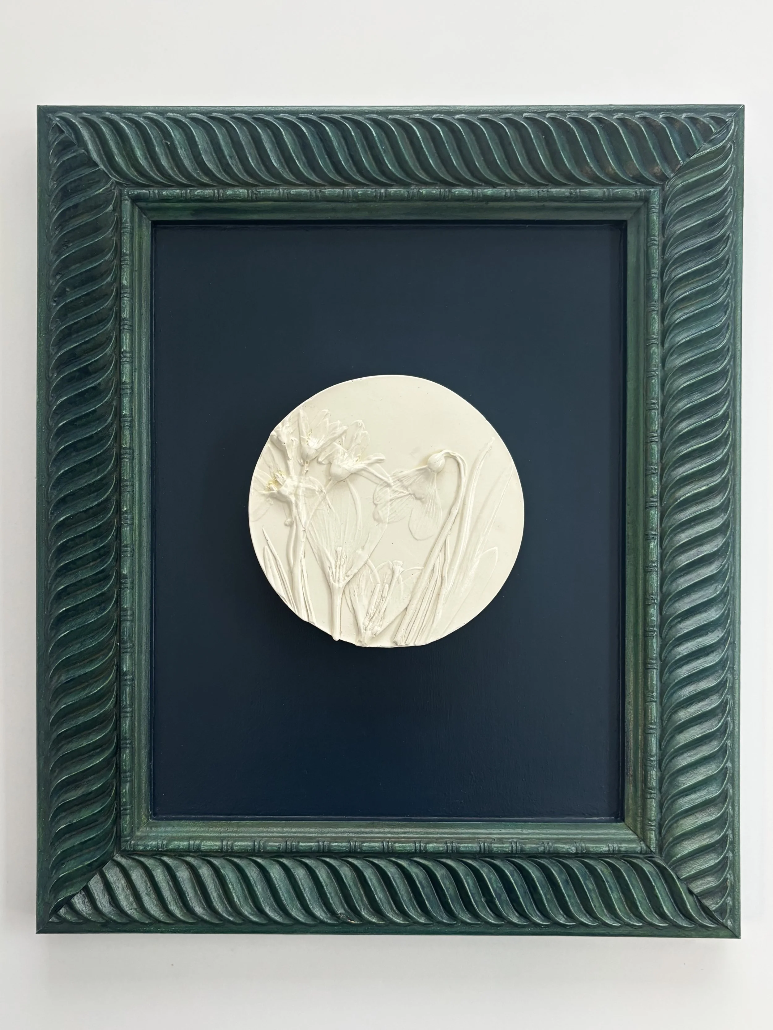  Renascent, milk-paint topcoat on plaster, milk paint and mineral paint on wood frame, 13in x 11in x 0.75in (ready to hang with picture-wire on back)    A tranquil scene of spring botanicals capturing the gentleness of the rising warmth following win