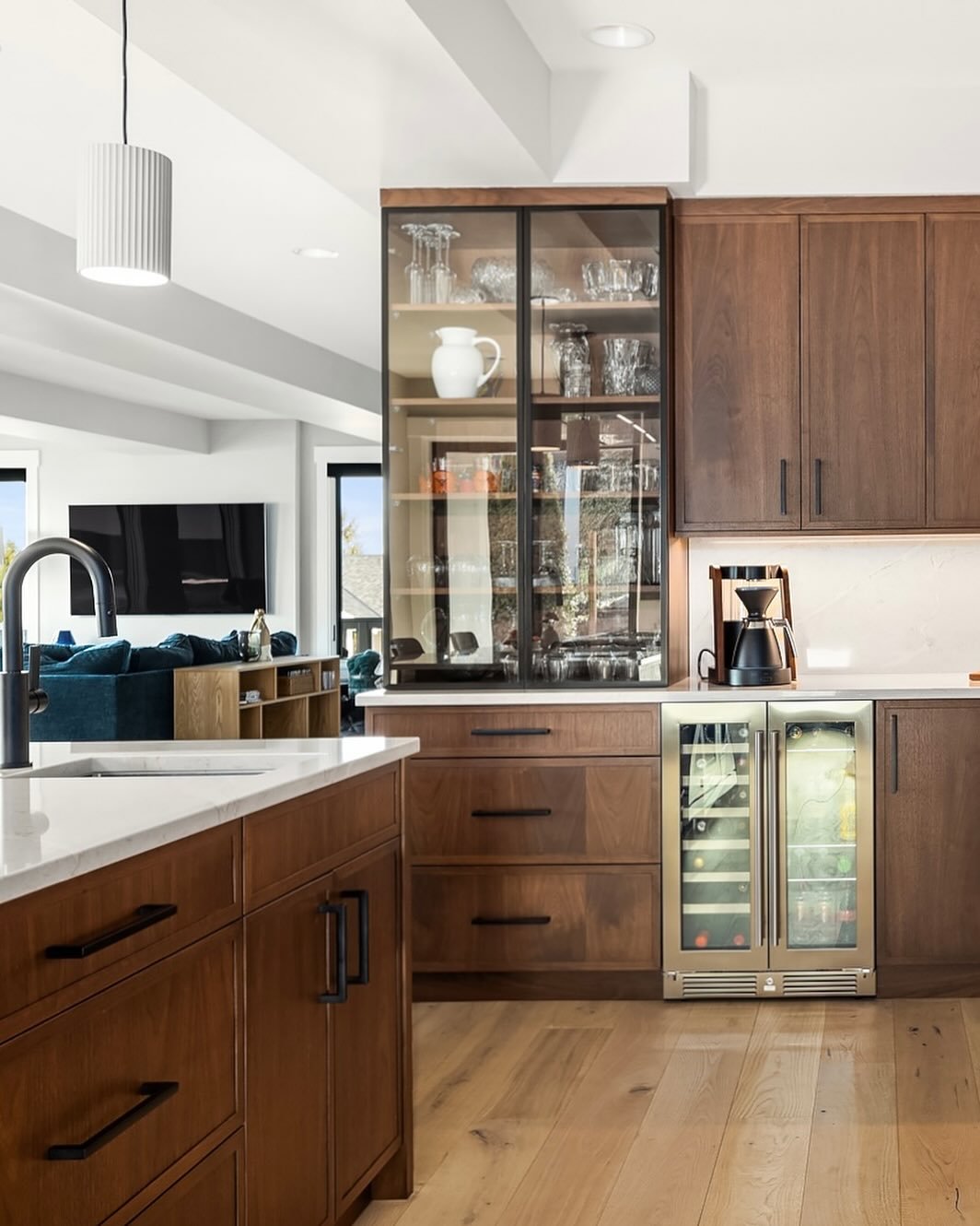We all could use a little mini bar set up on our kitchens right? Stemware storage behind beautiful metal frame glass doors, under counter beverage cooler, worlds coolest coffee machine, drawers for napkins &amp; wine openers &amp; cabinets for mixers