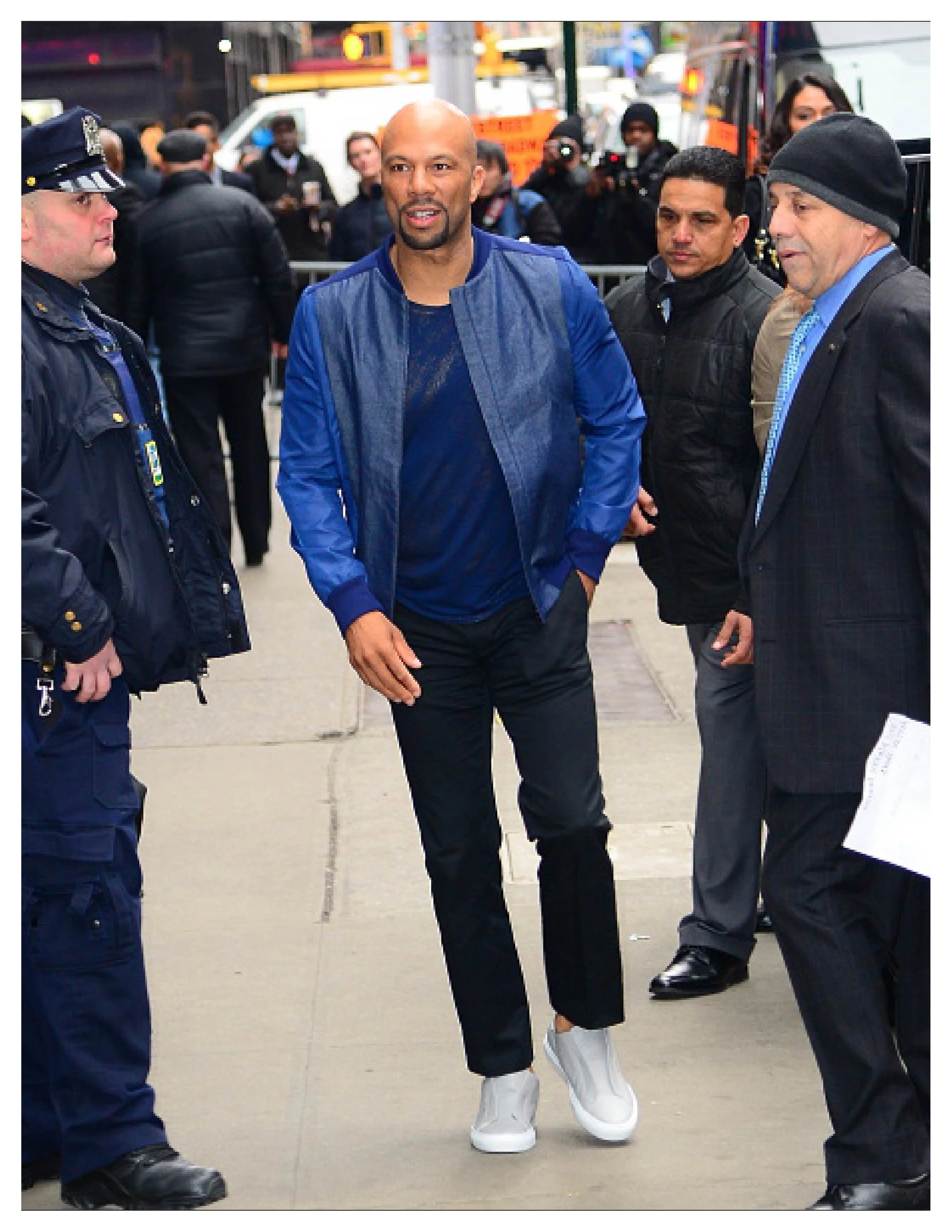 Common wears GARCIAVELEZ bomber in New York City promoting "Barber Shop 3"