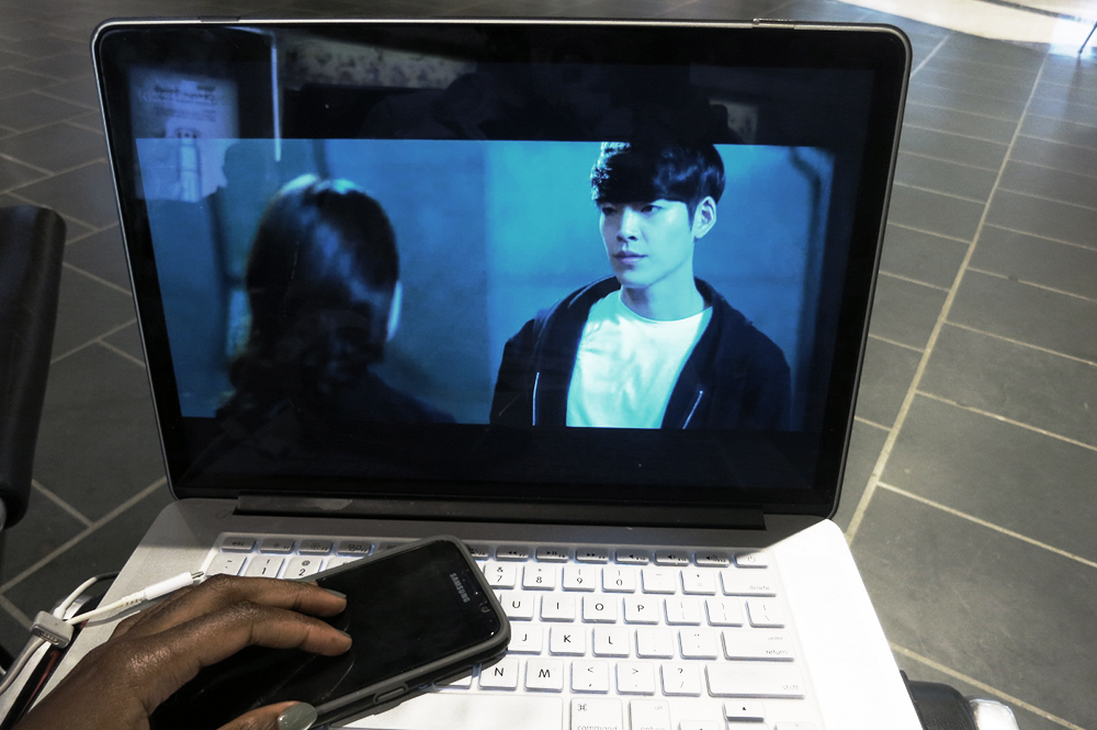 Watching the Korean movie, "Twenty", while I wait for my flight to board.