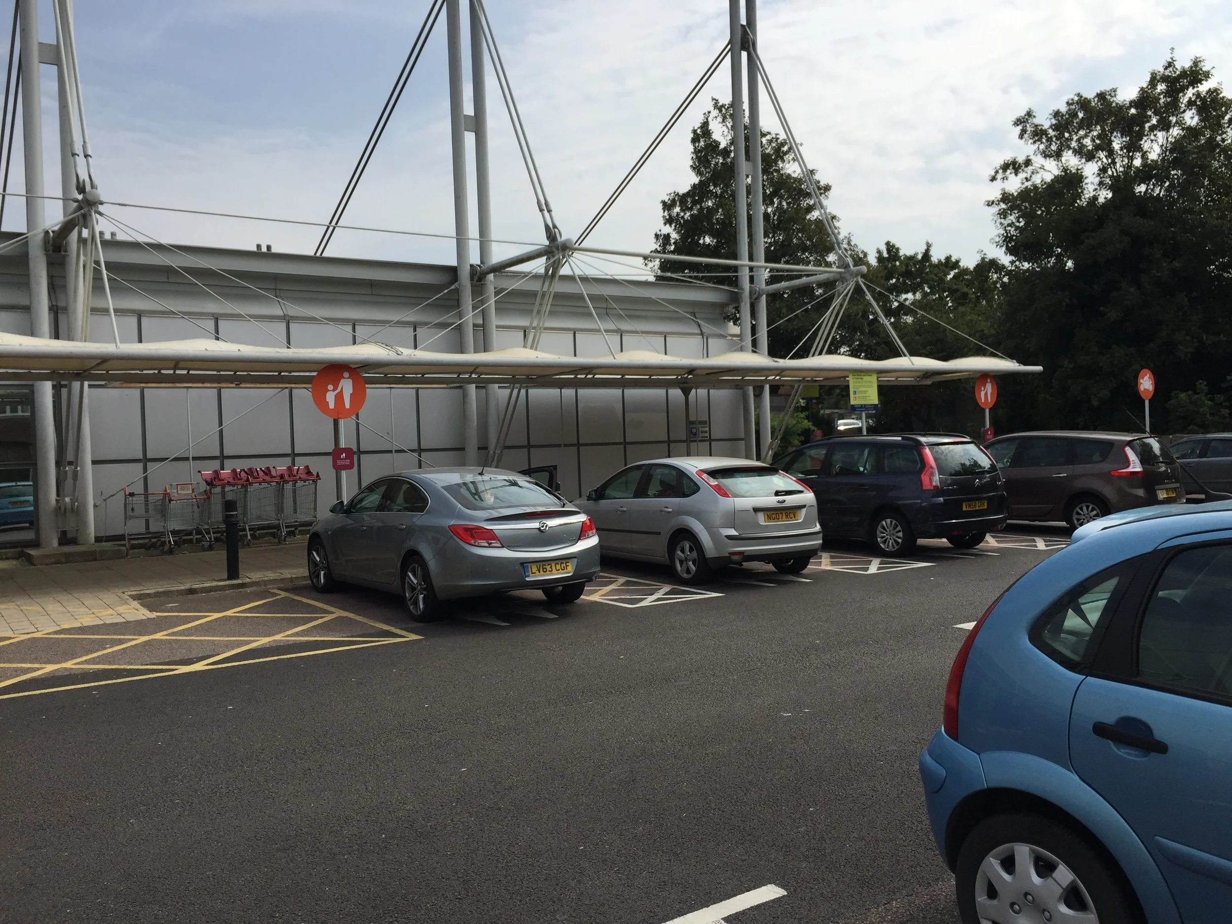 You will find your way to the mother and child parking spaces, keep going.