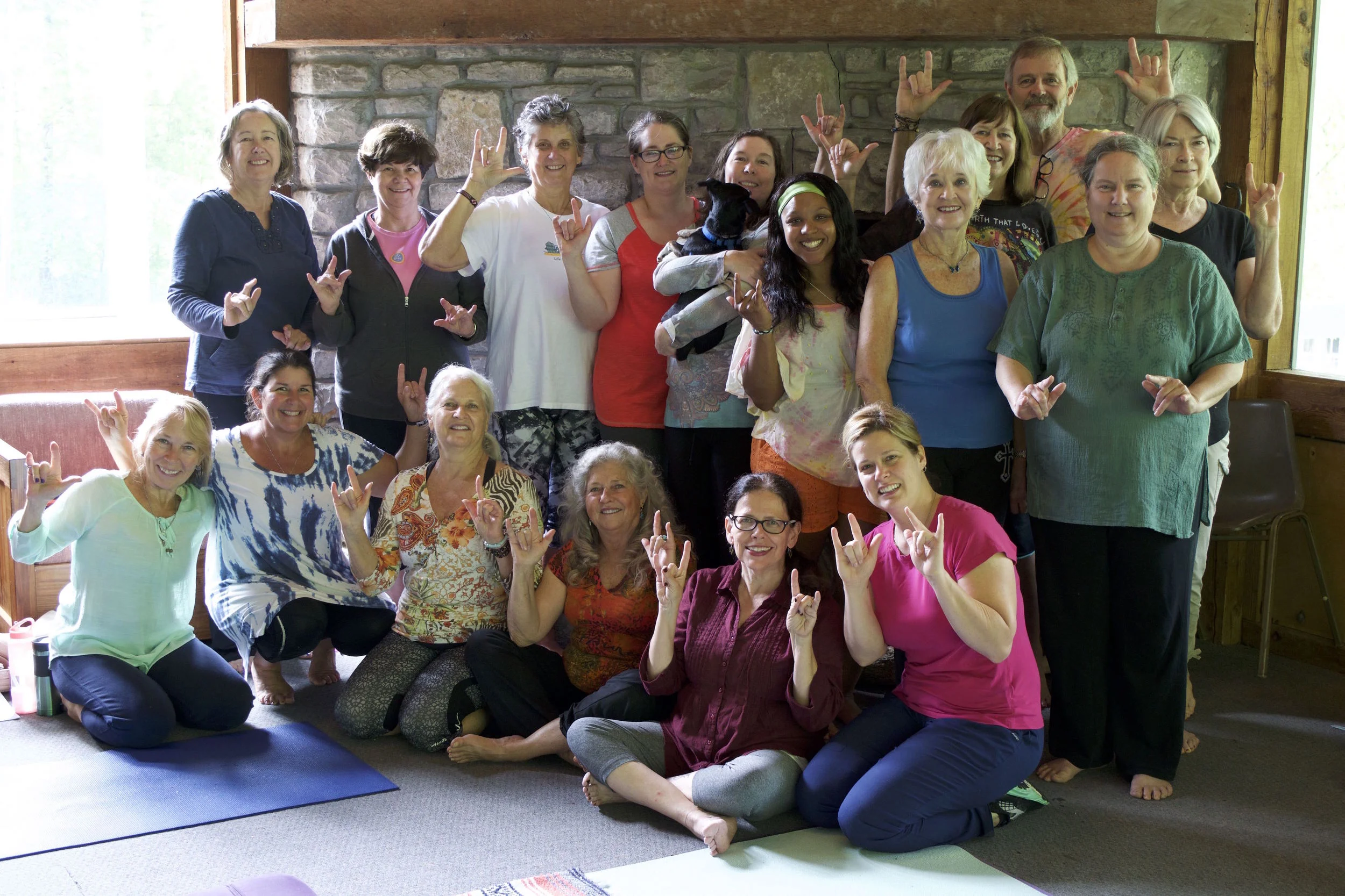 The hand mudras represent Love and You Only Live Once (YOLO)