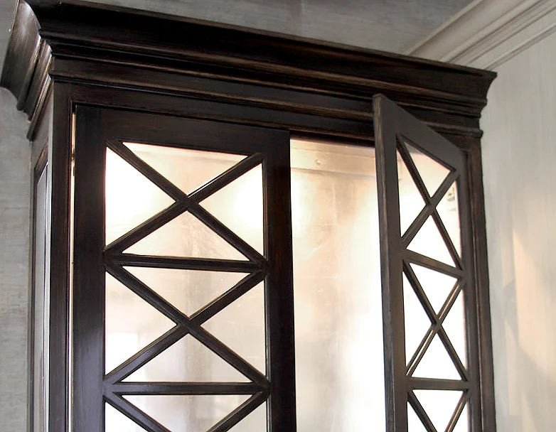 Painted Java-color finished cabinetry exterior with genuine silver leaf interior