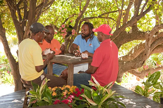 Photo of staff for cover of ANGUILLA LIFE magazine, taken at hill-top deck.