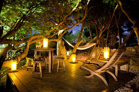 Hilltop deck with dominoes table and hammock.