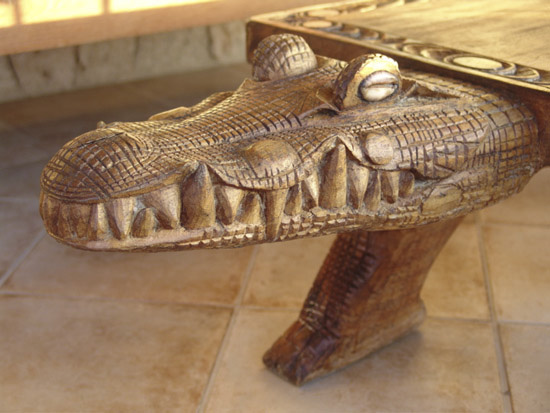  Detail of carved crocodile head which is part of patio table (Papua New Guinea) 