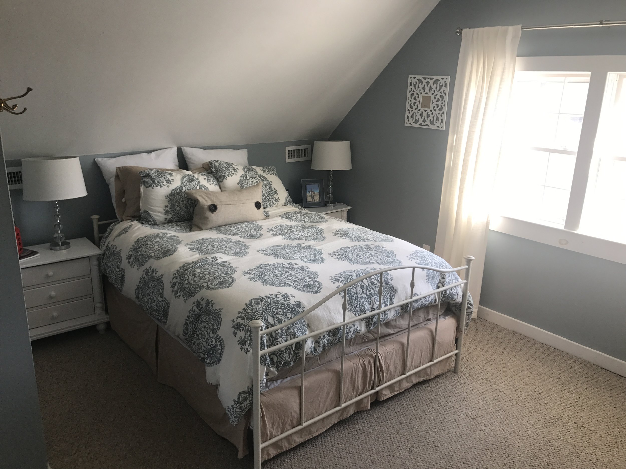 Upstairs master bedroom with queen bed