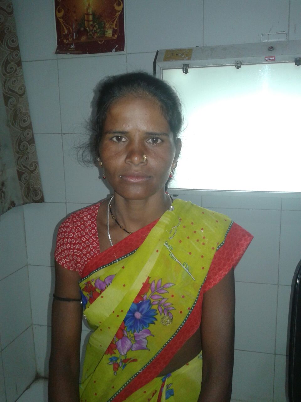 This is Rajui. She has been diagnosed with Pulmonary Koch's disease. She is 40 years old and housewife. Her oldest son is studying to become a lawyer. 
