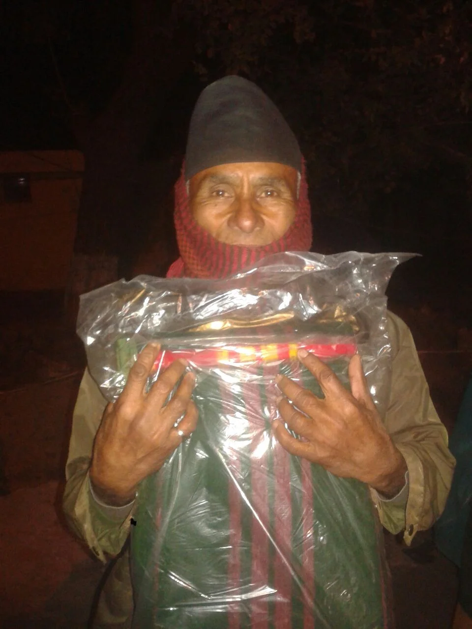 Meet Ajay. He is 52 years old and lives in a nearby slum. He says that his granddaughter just gave birth to twins. He says that there is not enough room in their home, so he is spending a few nights outside until his granddaughter and the twins get settled. 