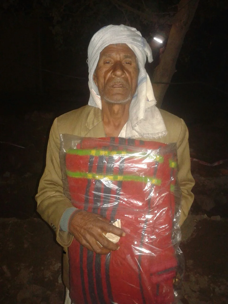 This is Dhruv and he is 65 years old. The jacket he is wearing in this picture is his father's.