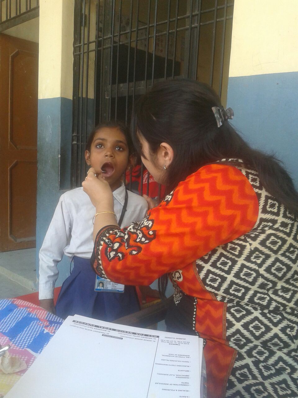 This is Sumi, a 6 year old girl and classmate of Sandya's. She is incredibly energetic and was very curious about our dentist's instruments. She says she wants to be a dentist when she grows up.