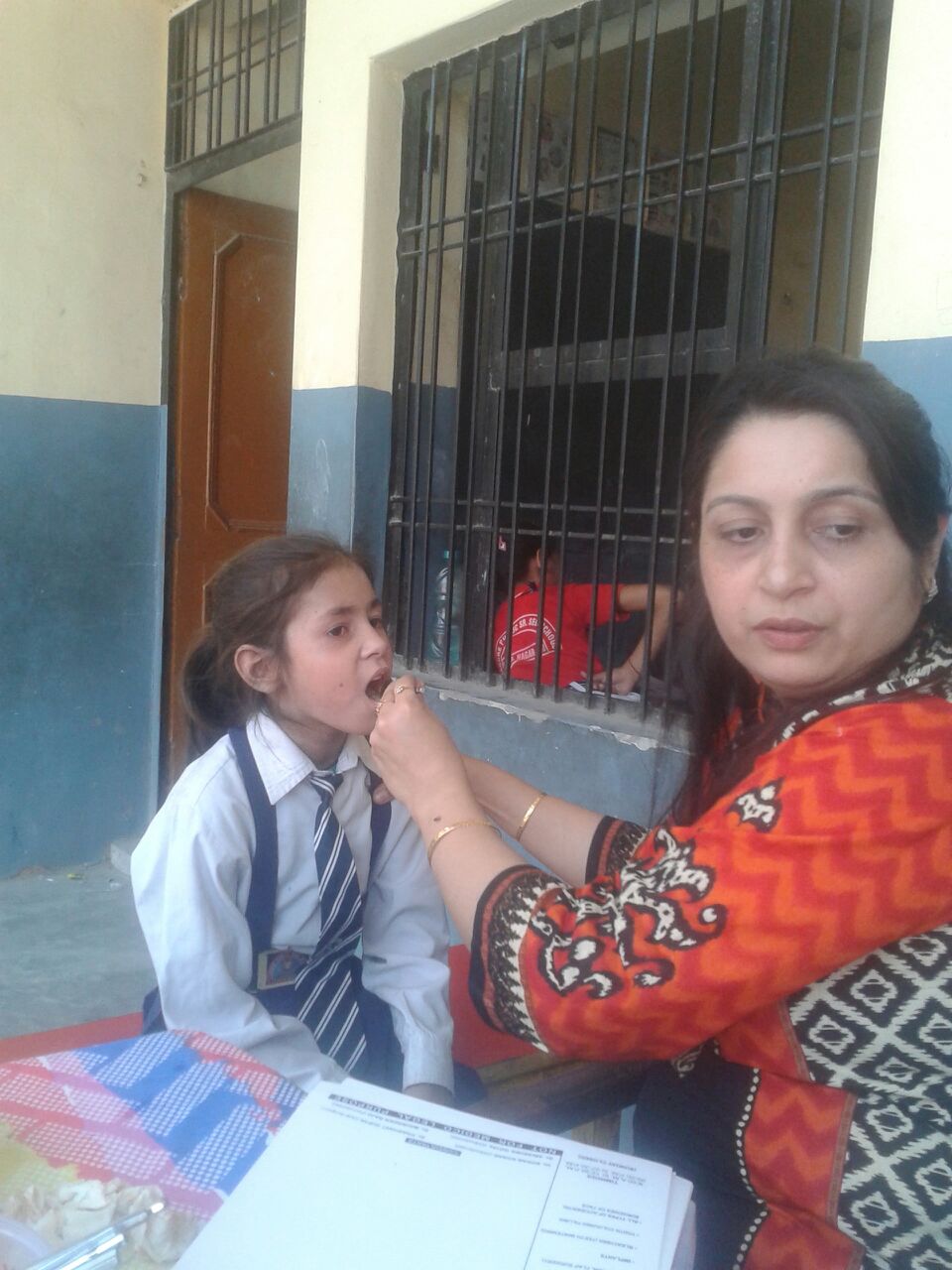 Kyra is also 6 years old. She is Aadhya's classmate and best friend. She has never seen a dentist before and was a little nervous. Aadhya helped relax her. 