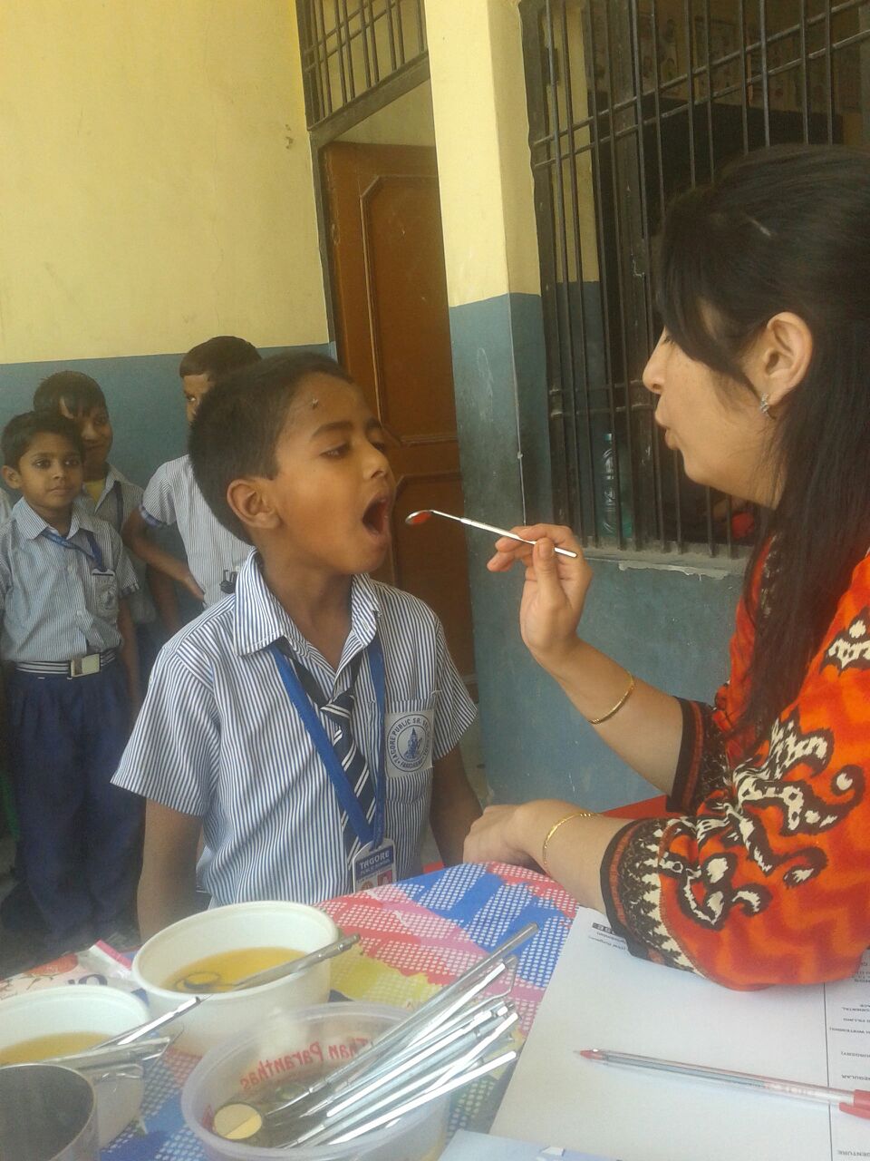 Ali is 7 years old and has one younger brother and one younger sister. He says that he wants to be a doctor when he grows up, so that his younger siblings will have a role model.