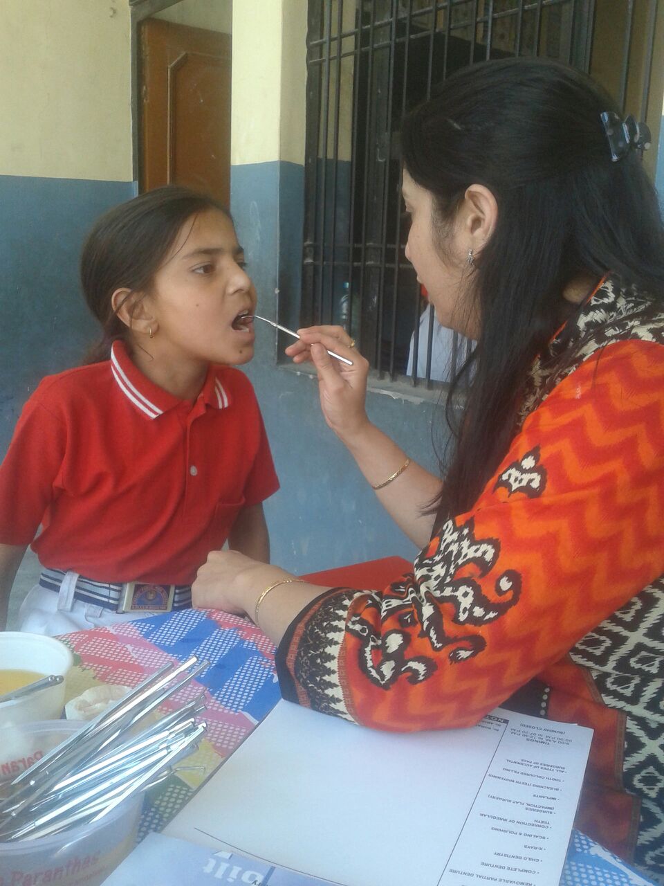 Idris is 7 years old. She has an older sister who works as a laborer. 