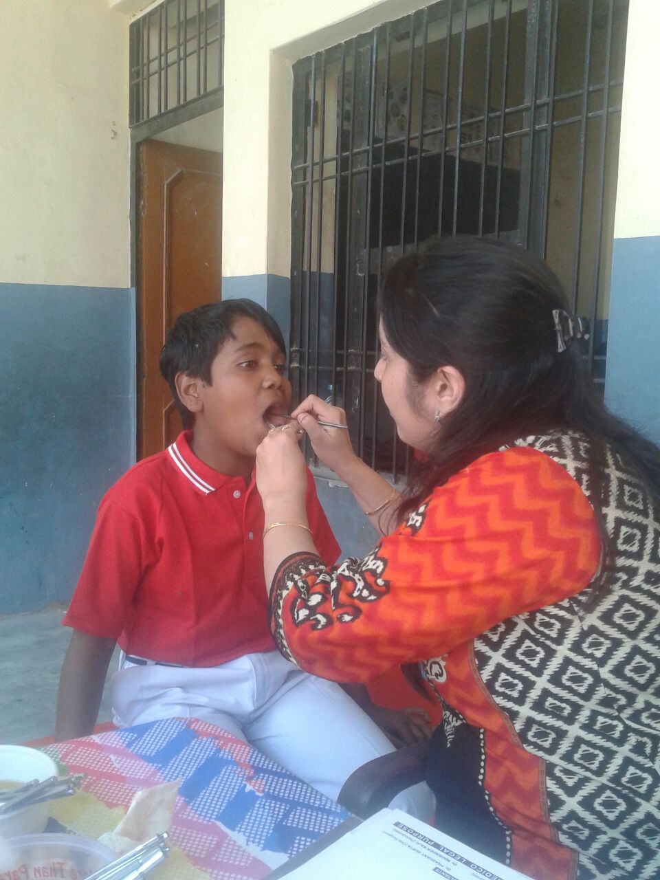 This is Udeep. He is 11 years old. He had never seen a dentist before this camp. He said he liked how his teeth felt after his visit. 