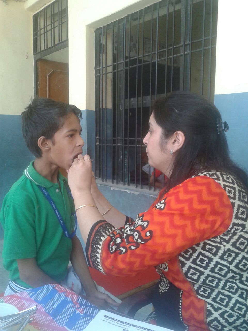This is Nal. He is 9 years old. He has been having tooth pain for the past 3 months. 