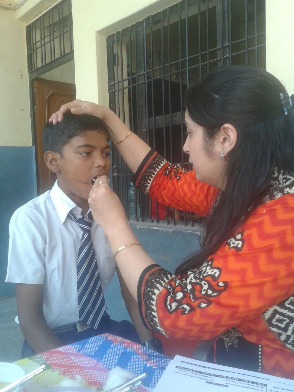 Dakshi is 9 years old. He has a twin named Daawir, who was not at school that day due to having a fever. We spoke with his parents and prescribed medication for Daawir.