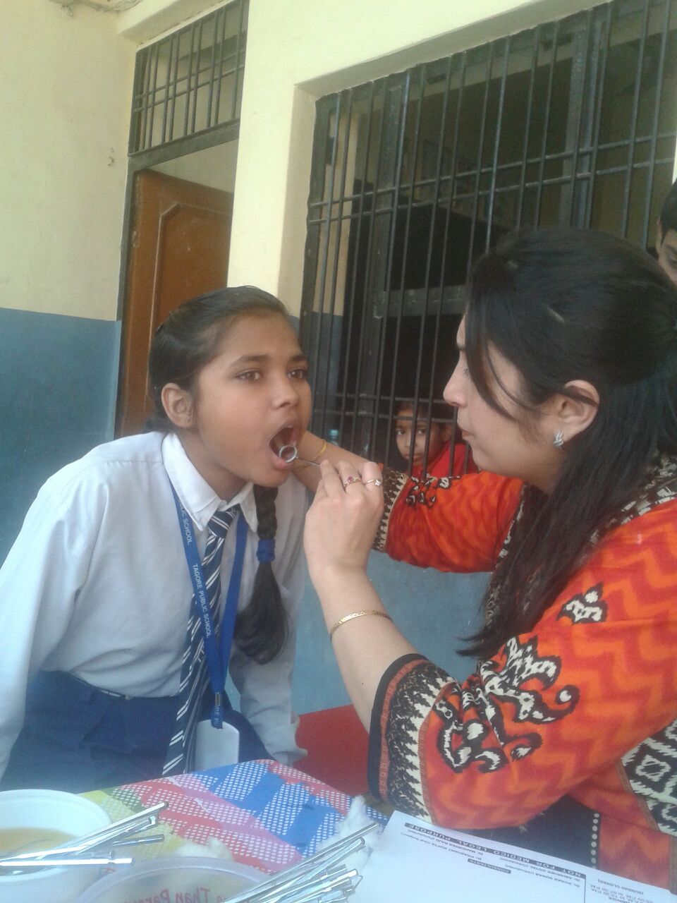 Ria is 12 years old. She wants to be a doctor when she grows up. After this visit she said she will consider dentistry. Our dentist (right) was happy to hear this. 