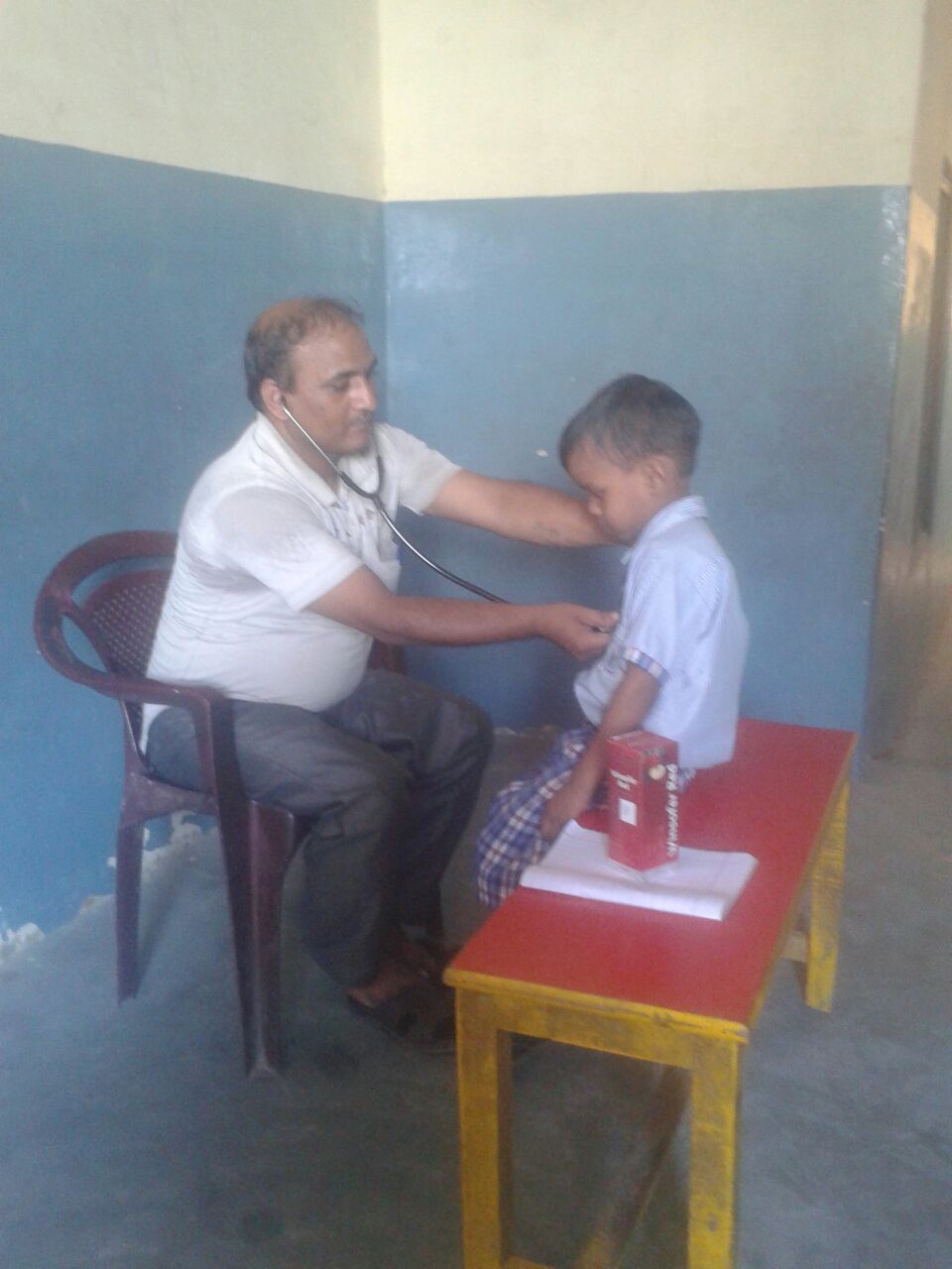 Meet Kirtin, a 4 year old boy with an undiagnosed condition. One of of our volunteer physicians (pictured to the left) believes he has autism. We need to have Kirtin follow up with a child psychologist to determine his diagnosis. 