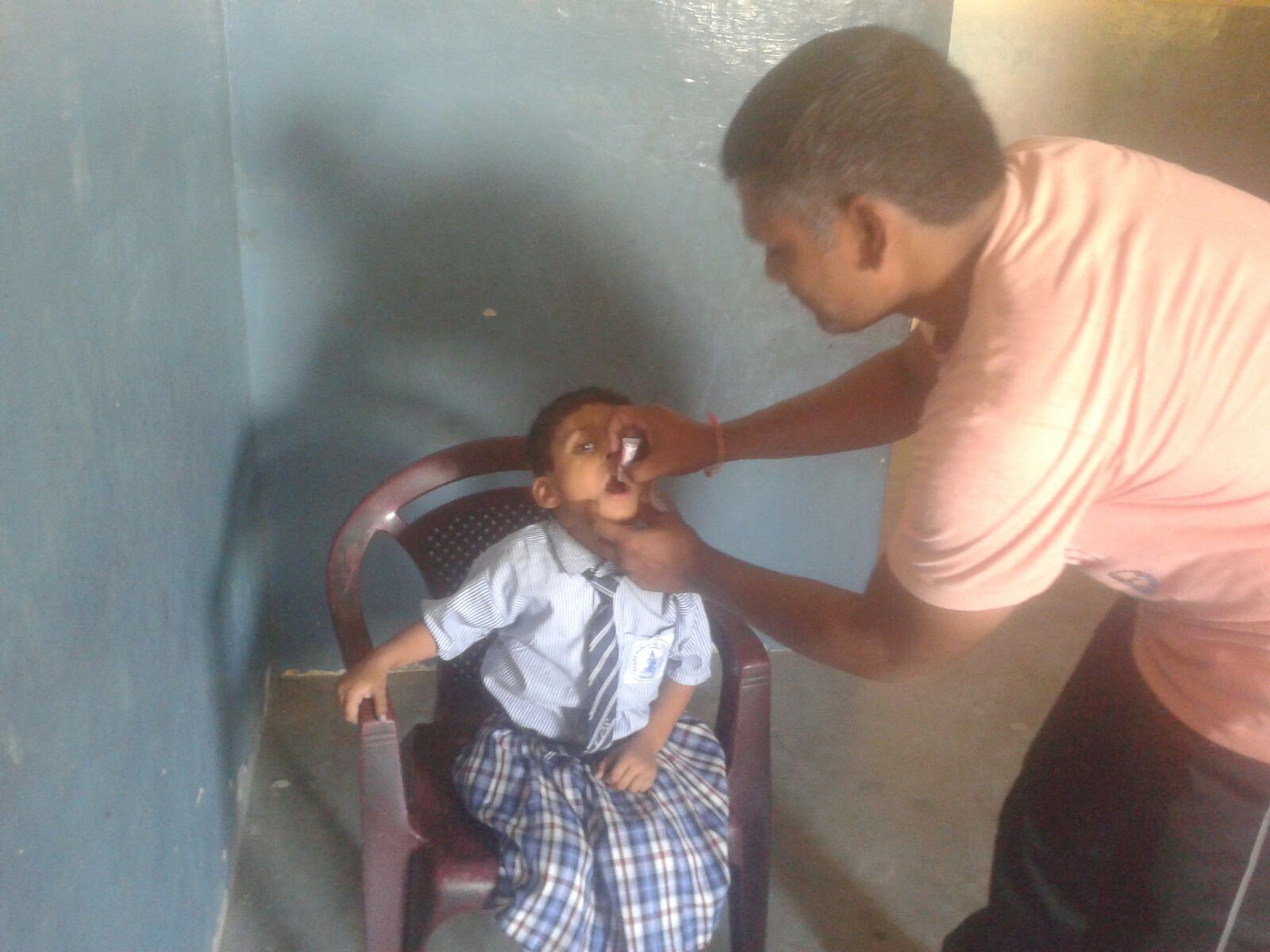 Meet Akash, a 4 year old boy who wants to be an engineer when he grows up. "He loves to build things. Even if there are just sticks and rocks, he is making things out of them," his father told us. He is being vaccinated in this picture. 