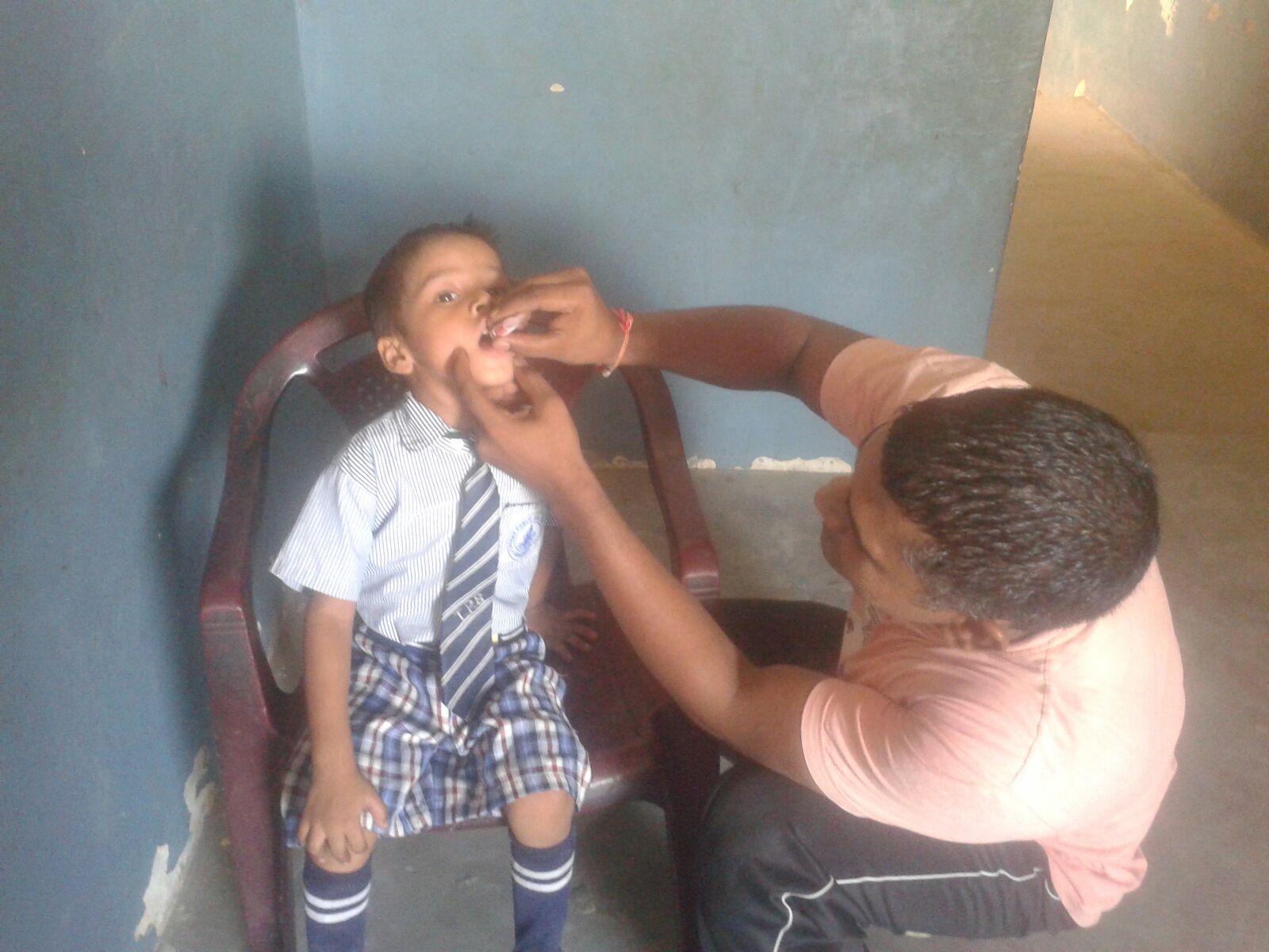 This is Khadim. He is 5 years old. He never received his vaccinations. He is the first in his family to be vaccinated.